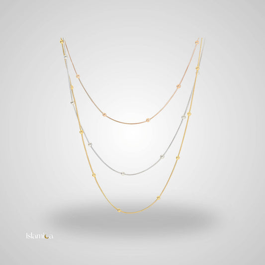 Goud-, zilver- en rosékleurige ketting met drie lagen